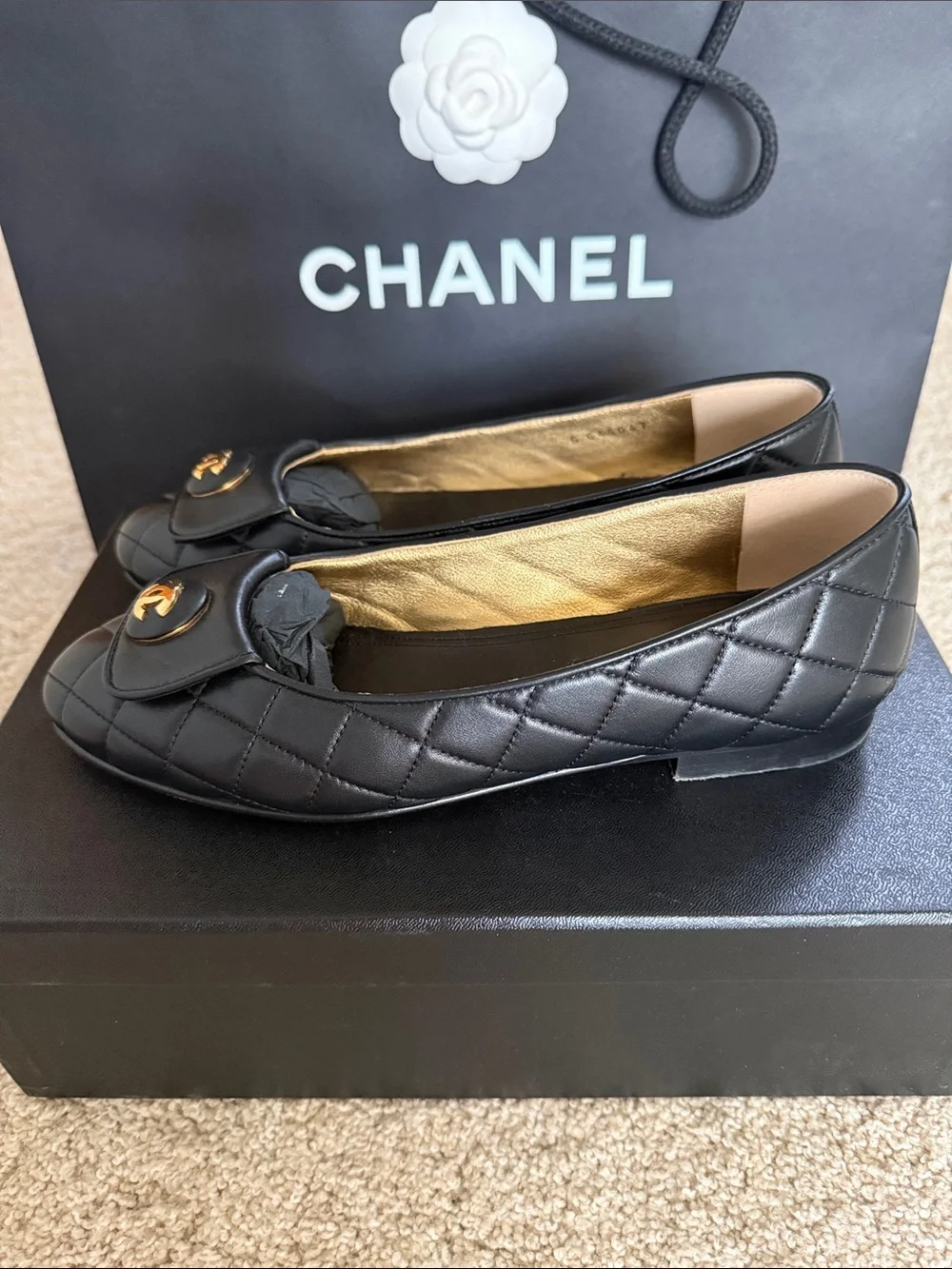 CHANEL Black Quilted Leather Ballet Flats with Gold CC Medallion